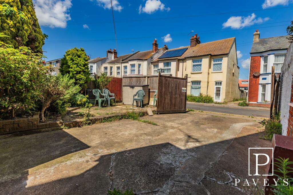 OUTSIDE REAR COUTYARD AND PARKING