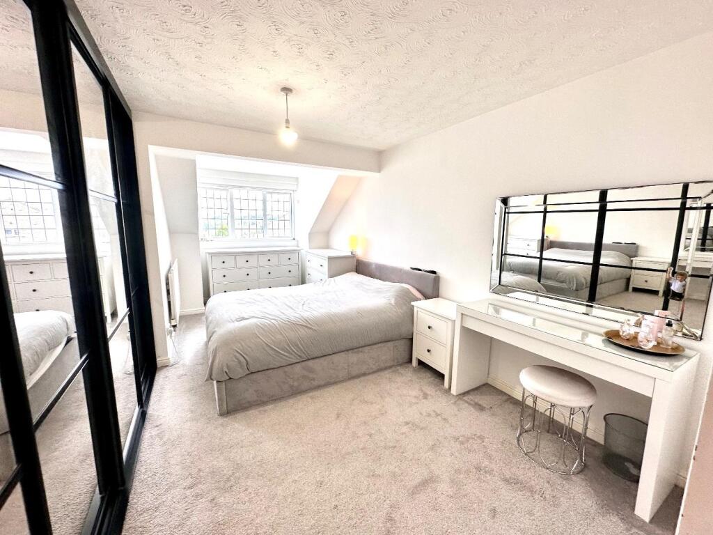 PRIMARY BEDROOM WITH EN-SUITE