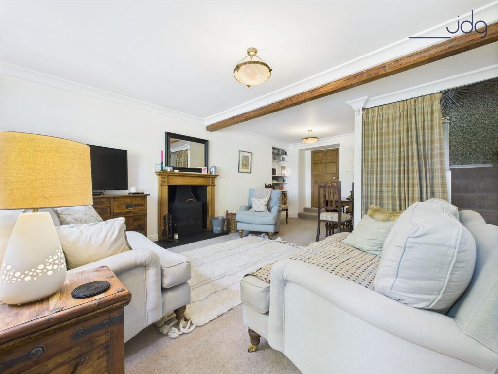 Living Room with open fire and room for dining