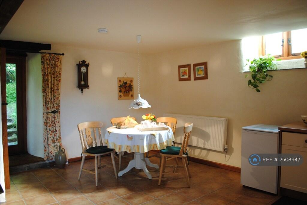 Dining Area (Showing West-Facing Window)