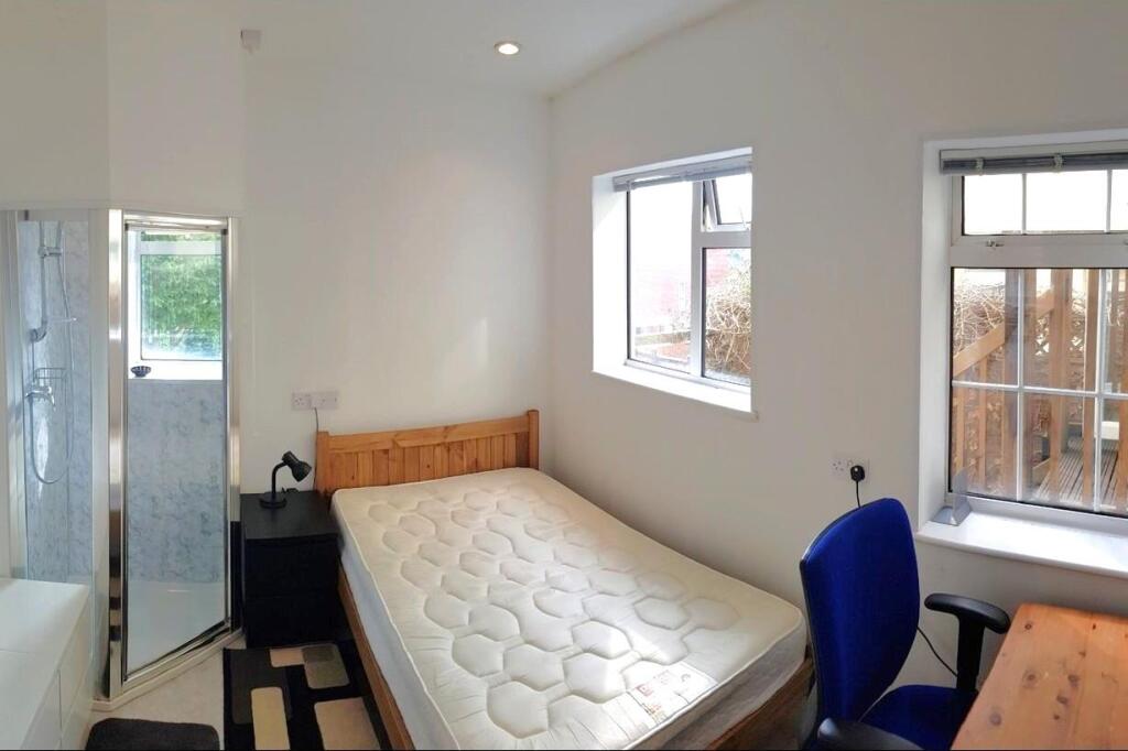 Bedroom 1 (with Shower).jpg