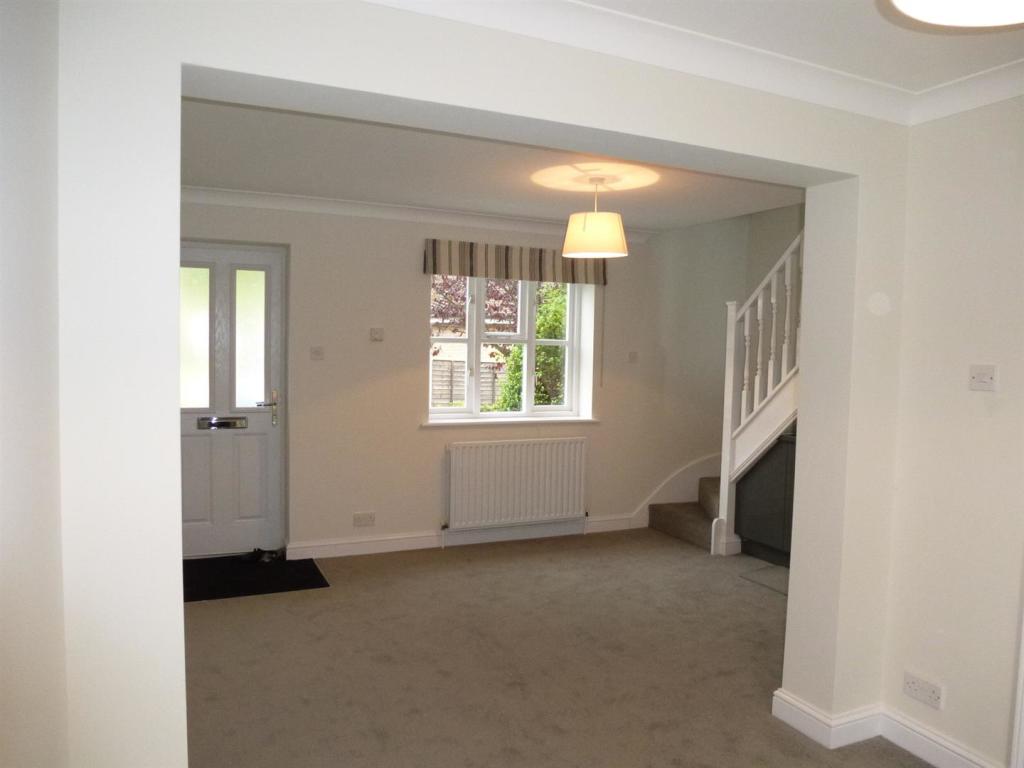 10 Jubilee Lane sitting room stair way.jpg