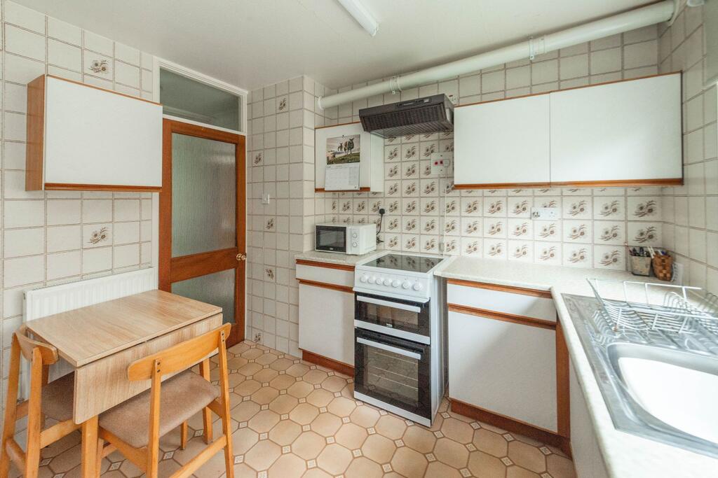 KITCHEN, DINING AND LIVING ROOM