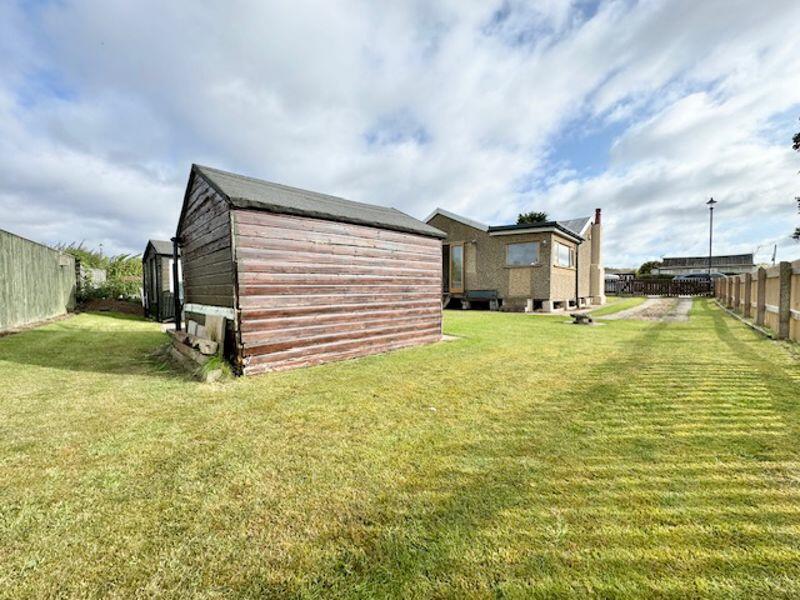 Rear garde and driveway