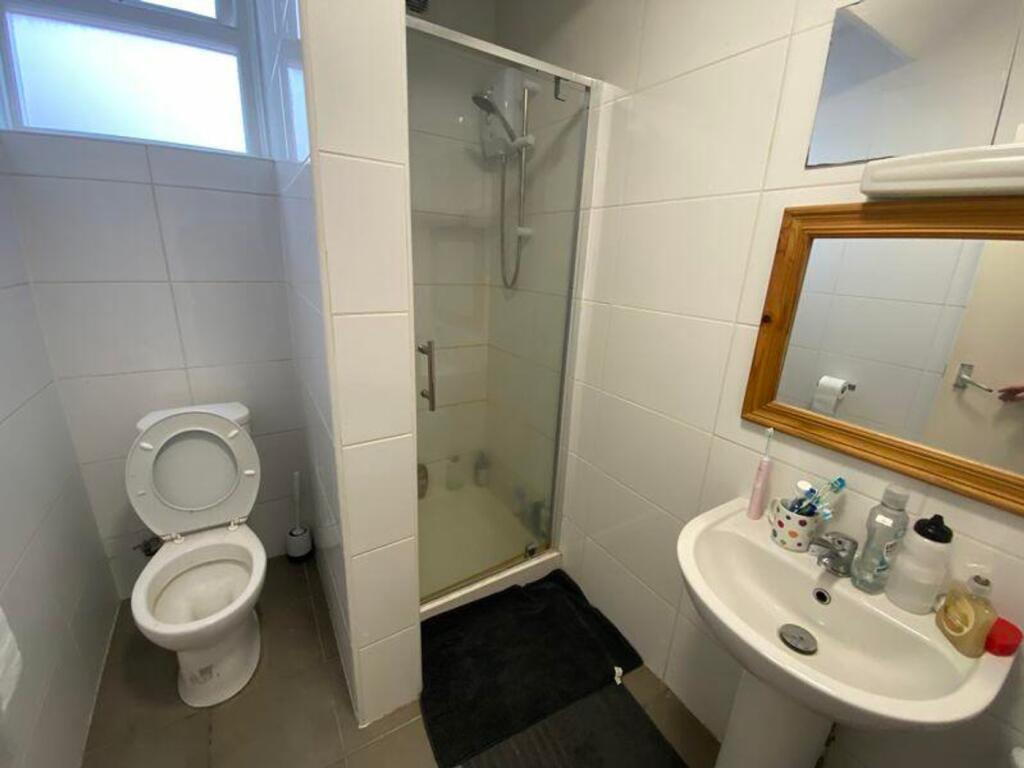 A bright and clean bathroom featuring a modern ...