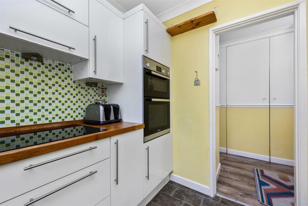 Downland Drive 62 KITCHEN TO HALL 2.jpeg