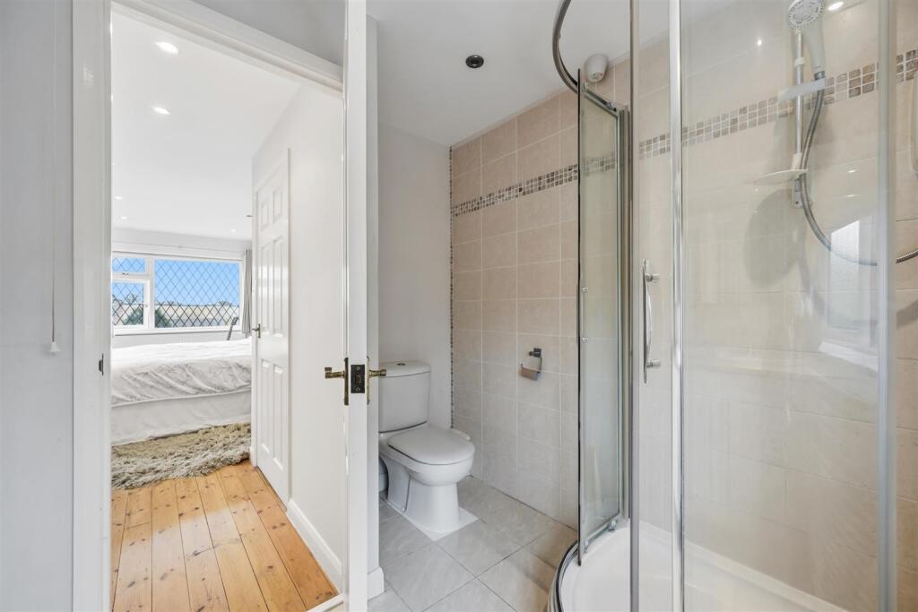 Bedroom One en-suite - shower and WC.jpg