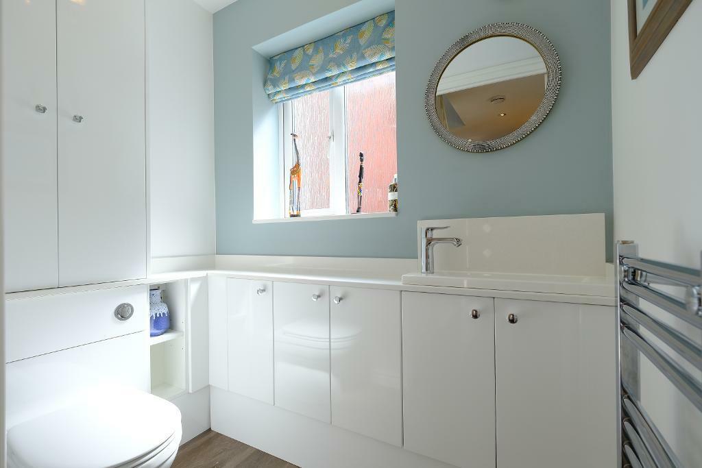 Cloakroom with handy cupboards