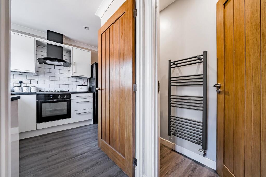 Entrance hall with view of kitchen and W.C..jpg