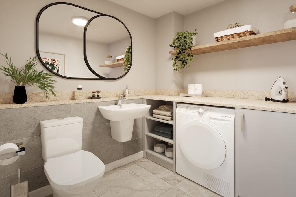 A handy downstairs toilet &amp; utility sits off the main entrance hall