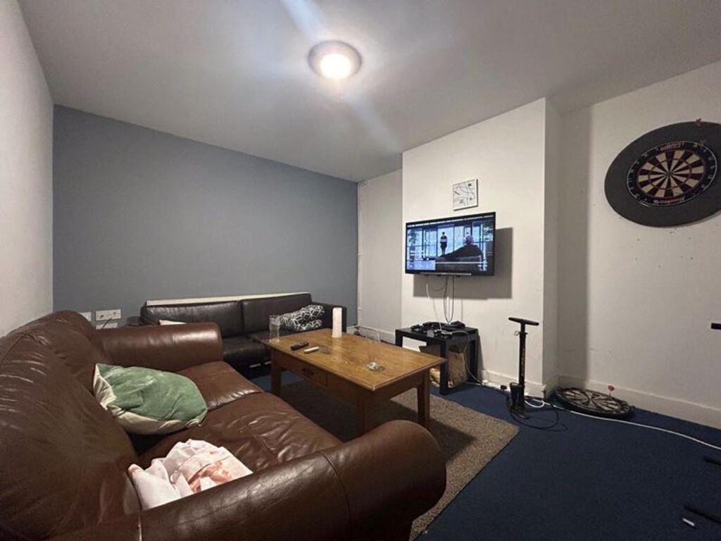 A cozy living room with a comfortable seating a...