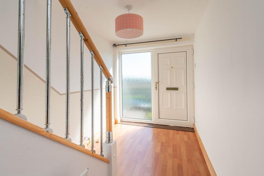 ENTRANCE HALLWAY AND LANDING