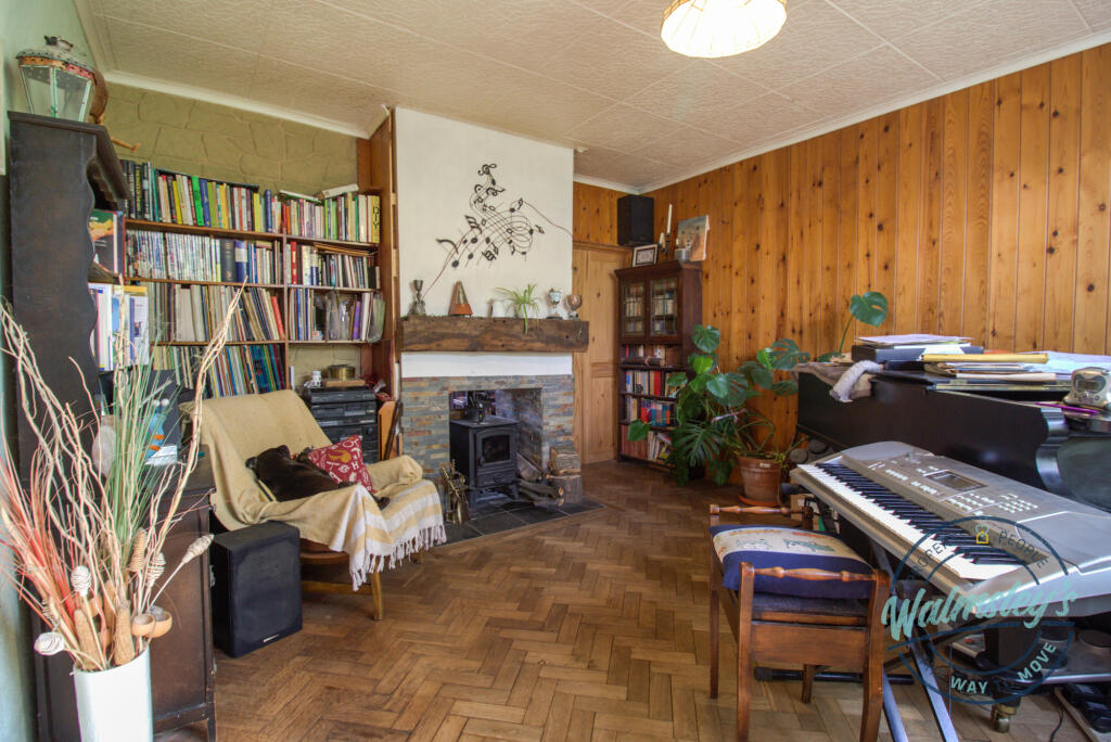 Sitting room with original parquet flooring