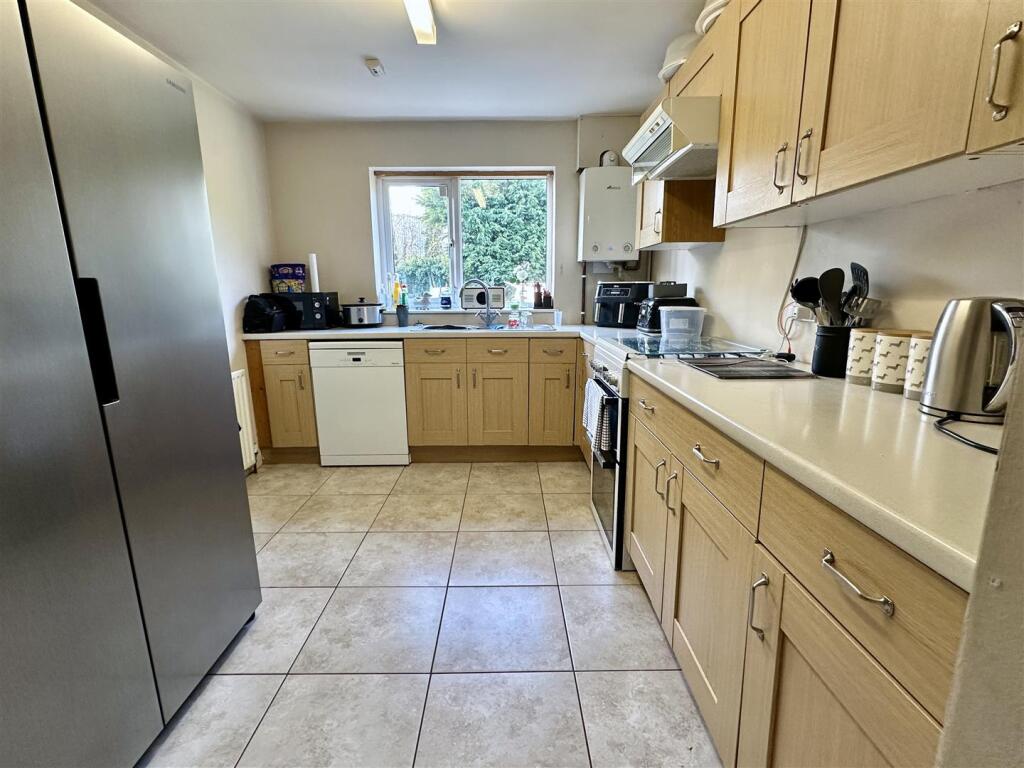 open-plan kitchen/dine/family room