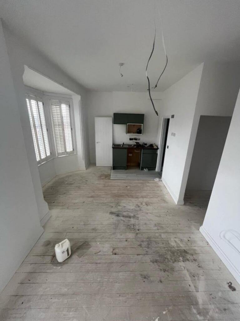 Spacious kitchen area featuring ample floor spa...