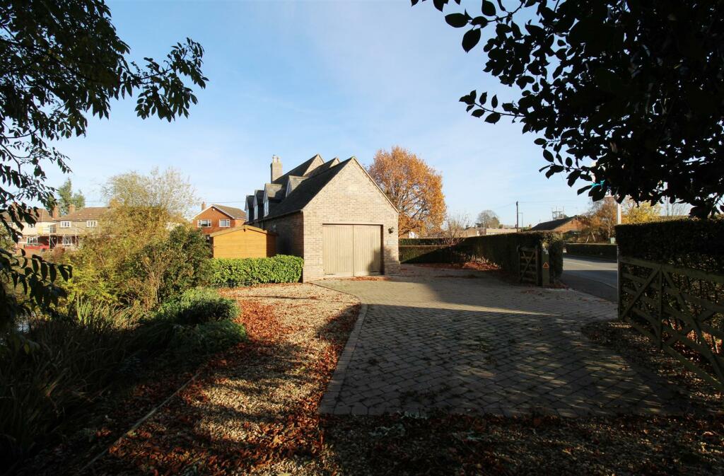 Detached Garage and Off-Road Parking