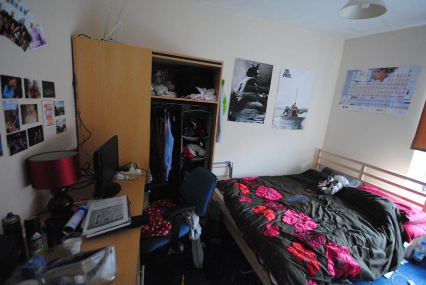 Welcoming, furnished bedroom with a double bed,...