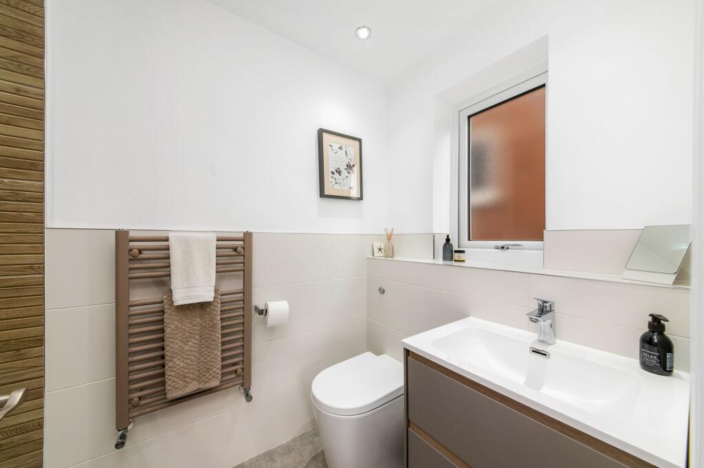 BEDROOM ONE EN-SUITE SHOWER ROOM