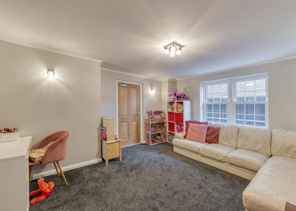 9 Henry Fowler Drive-sitting.jpg