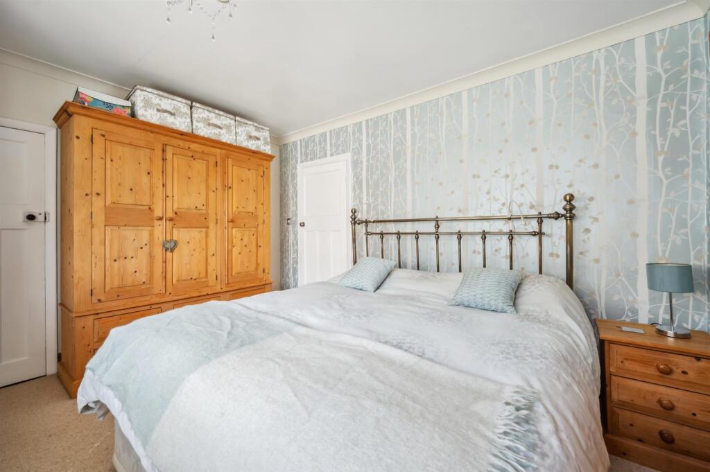 Bedroom One - bed and wardrobe.jpg