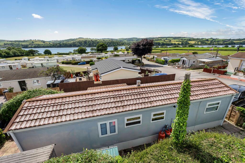 Rear of property with views beyond