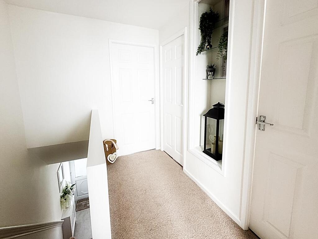 Stairs to first floor and landing