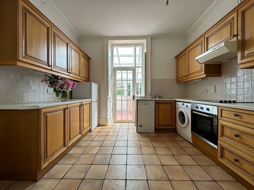 Large kitchen with tall ceilings