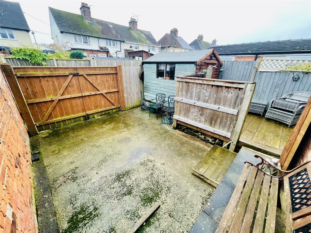 Single Driveway To The Rear Aspect