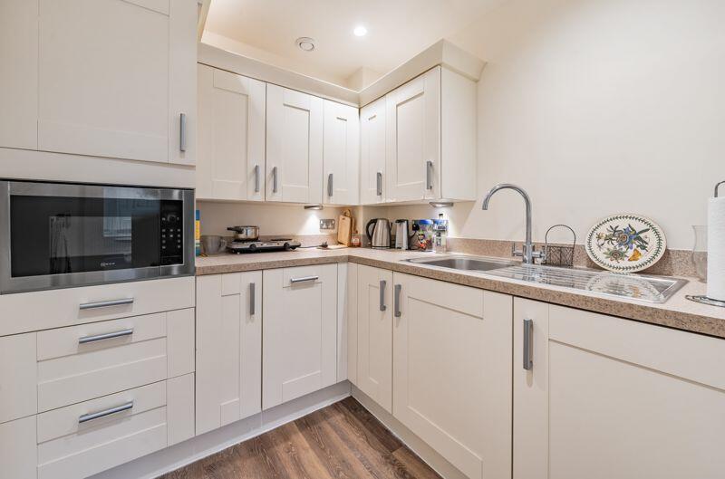 Kitchen with built-in appliances