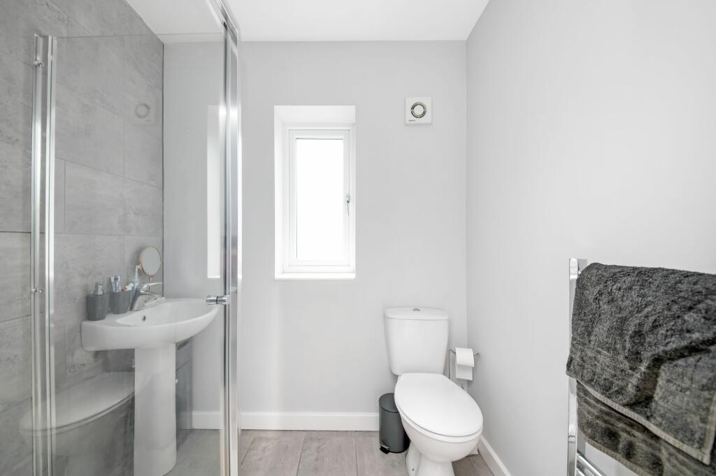 BEDROOM ONE EN-SUITE SHOWER ROOM