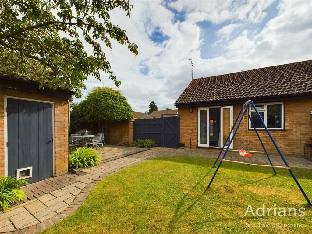 REAR OF BUNGALOW
