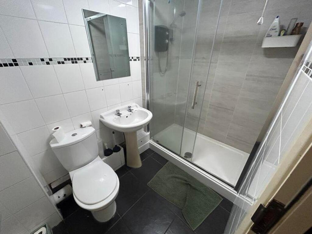 A modern bathroom featuring a clean and functio...