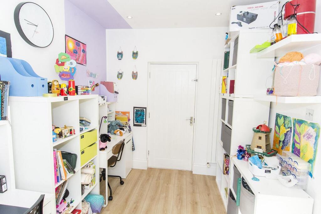 (Study/Family Room Photo Two)