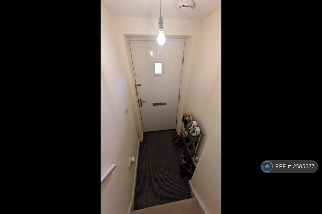 Front Door / Bottom Of Stairs