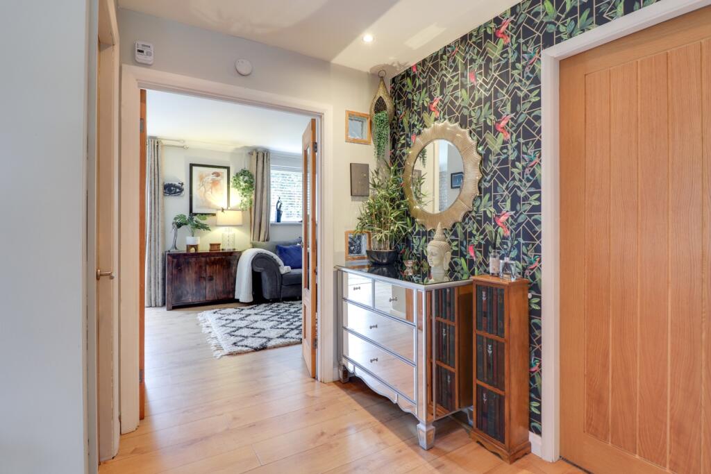 Hallway leading to lounge and dinning room