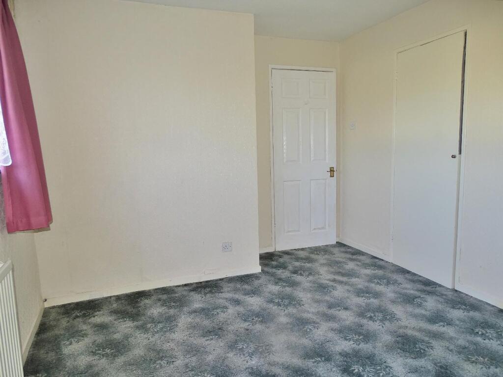 BUILT IN STORAGE CUPBOARD