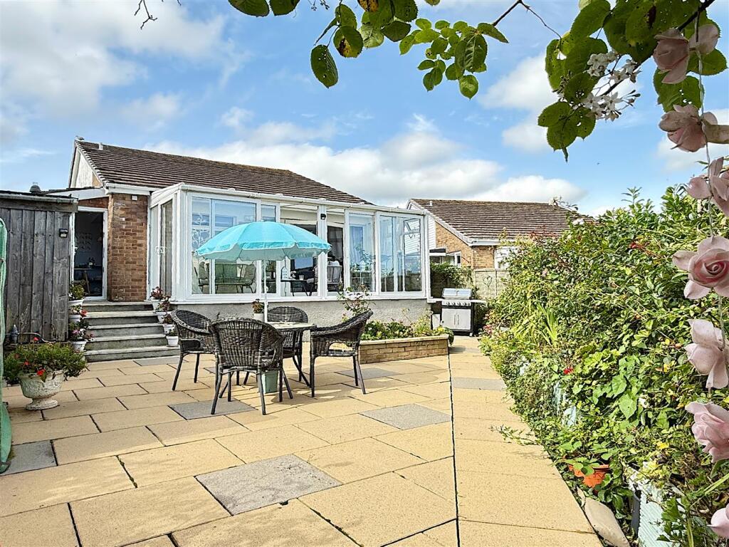 Rear Patio Towards Conservatory.JPG