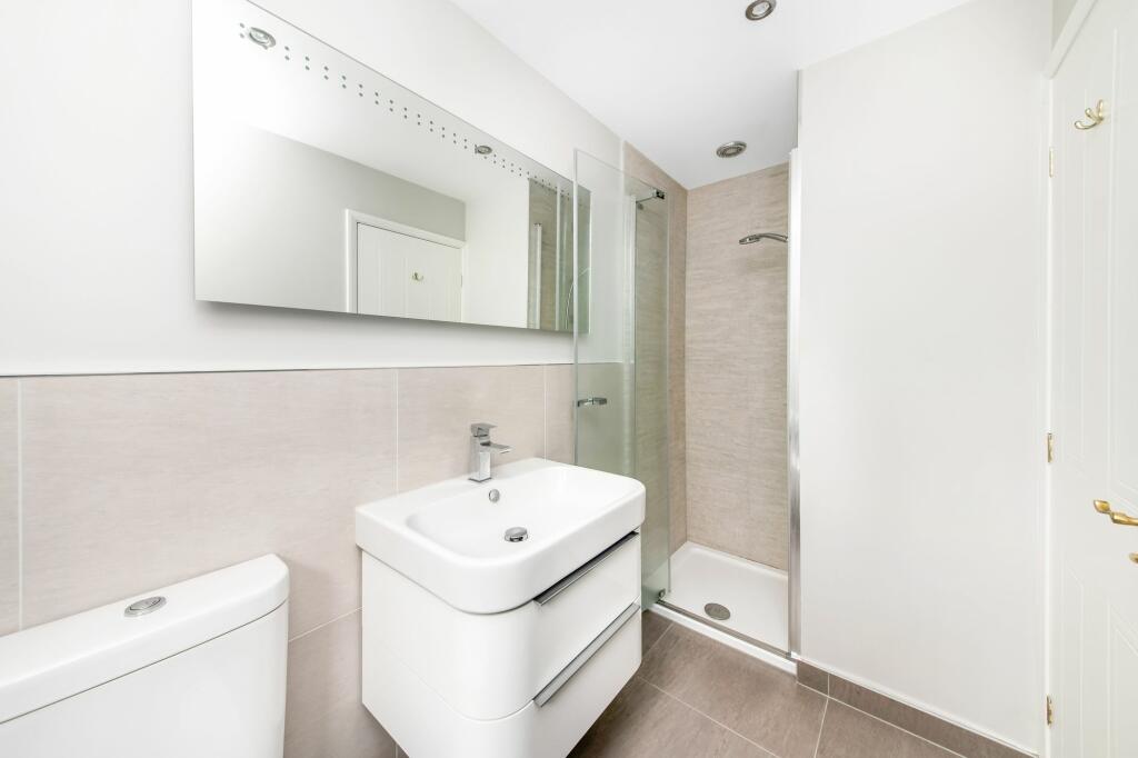 BEDROOM ONE EN-SUITE SHOWER ROOM