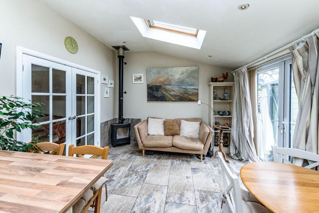 SITTING ROOM DINING KITCHEN AND UTILITY ROOM