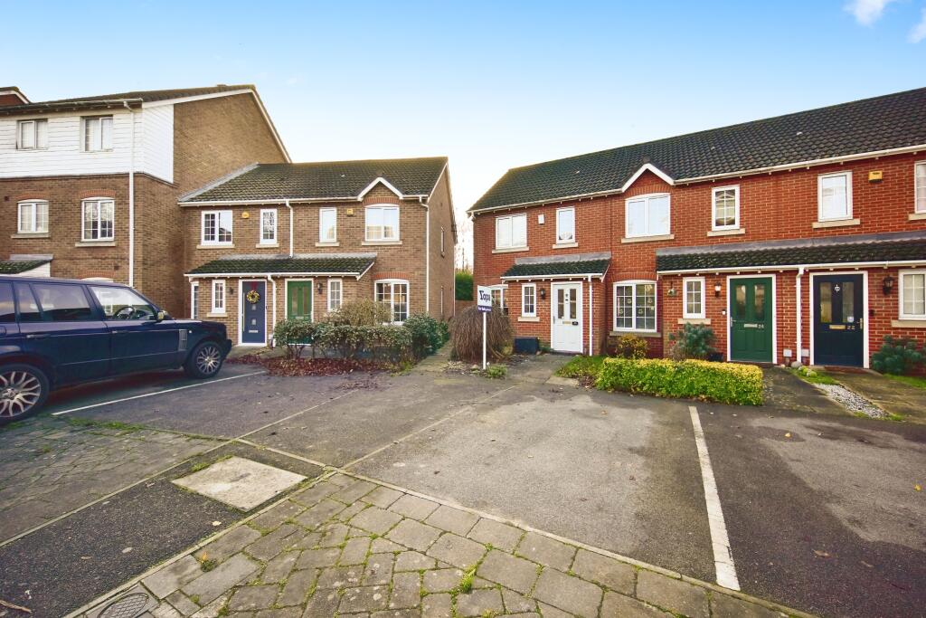 Outside View Of The Property With Driveway Parking