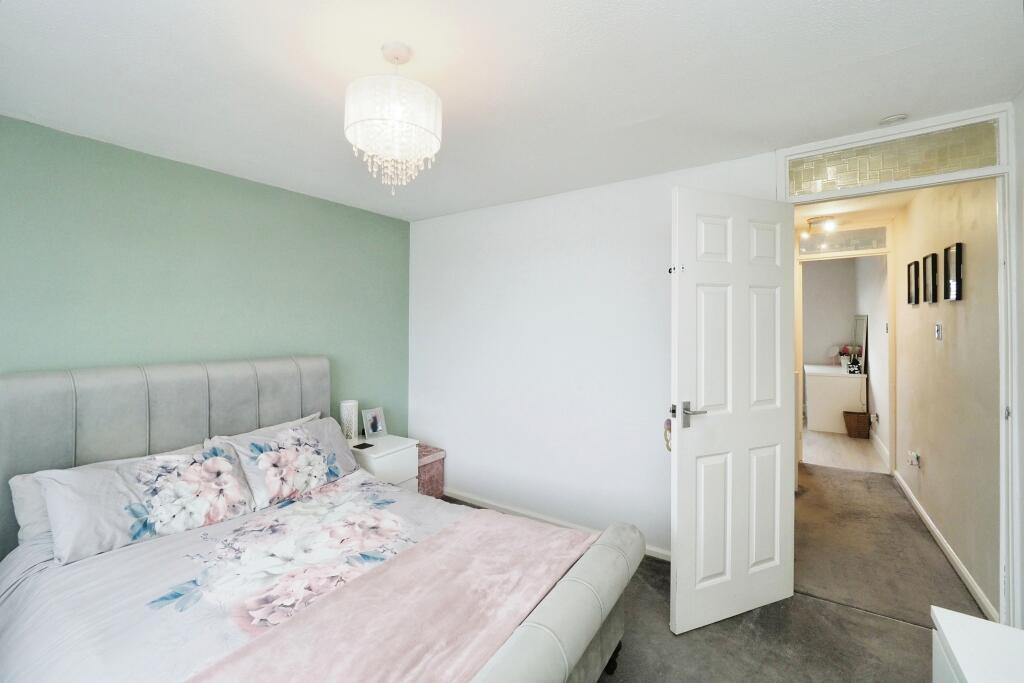 Generous and Softly decorate Main Bedroom