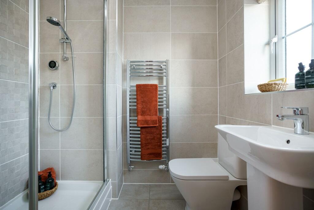 An en suite shower room away from the family