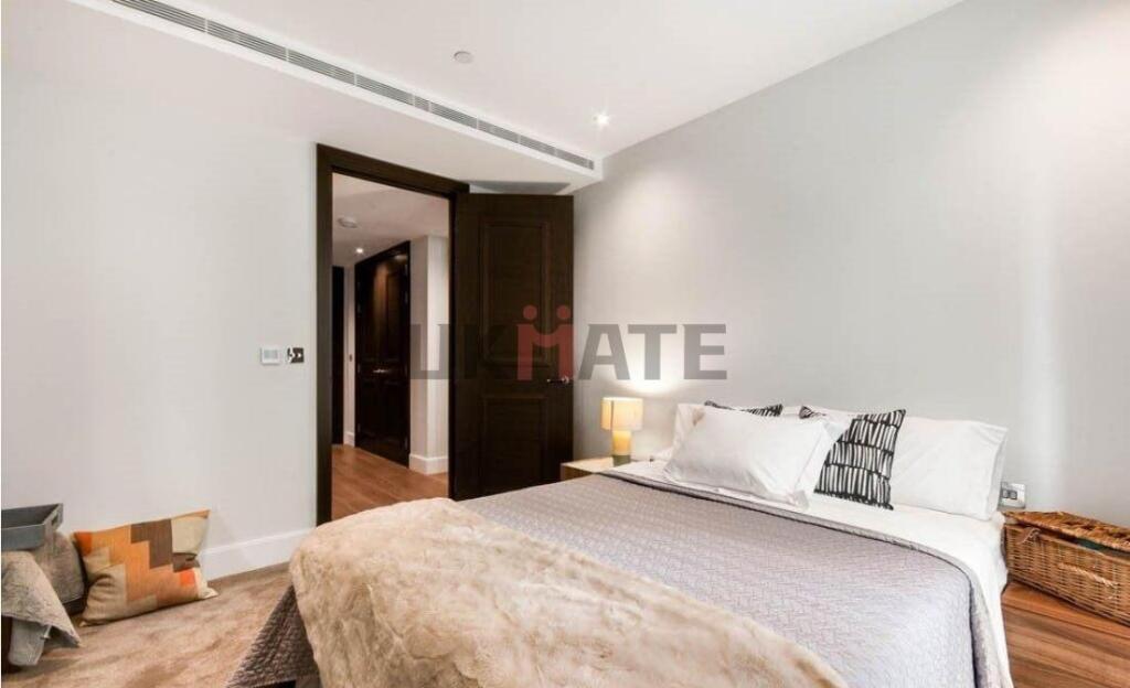 A bright and inviting double bedroom featuring ...