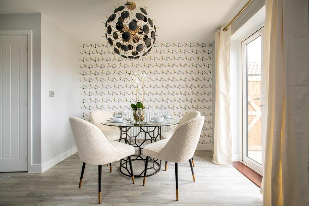 A sociable dining space off the kitchen, open the doors to the garden for an al-fresco feel