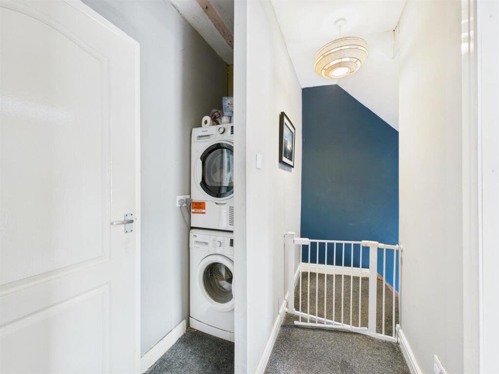 First Floor Landing/ Utility Area