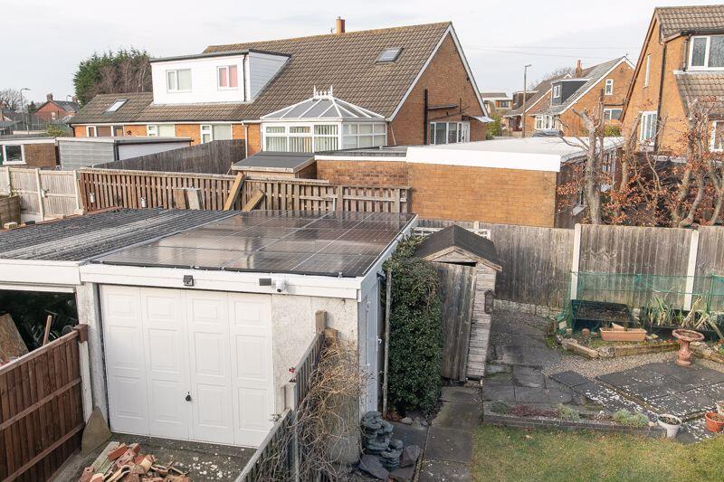 Solar panels on roof and garage