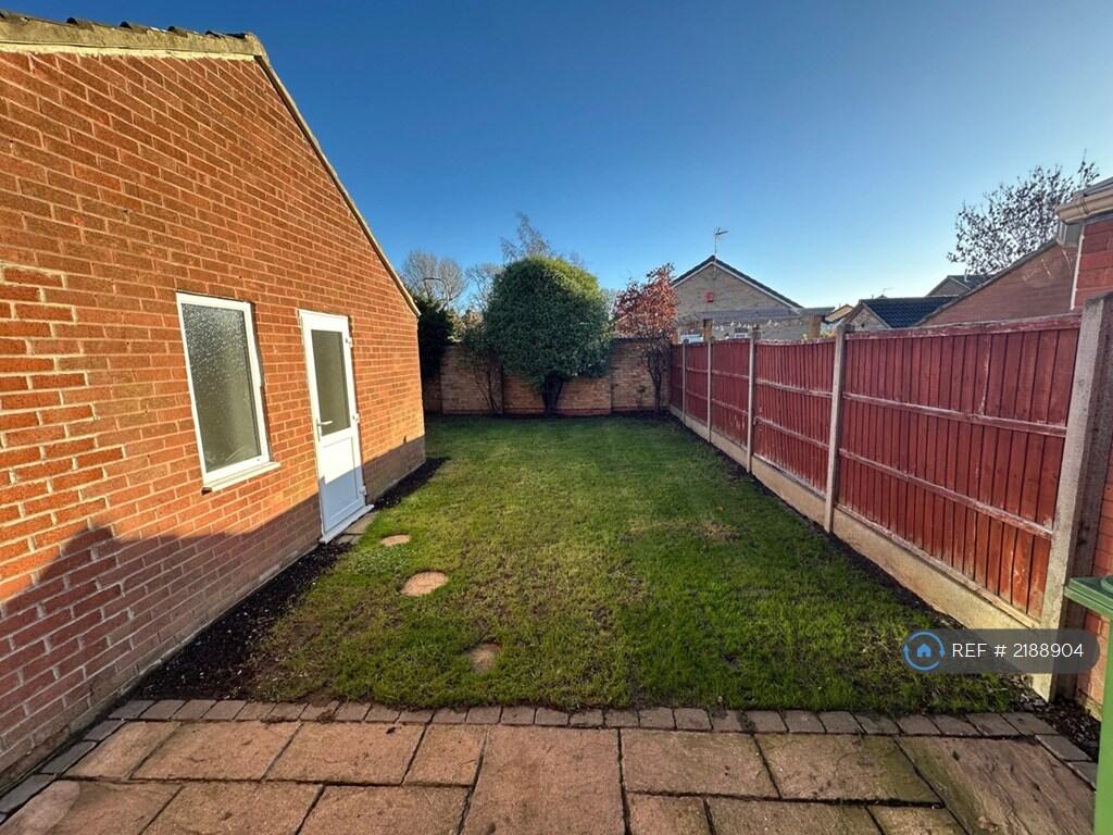 Garden And Side Door To Converted Garage