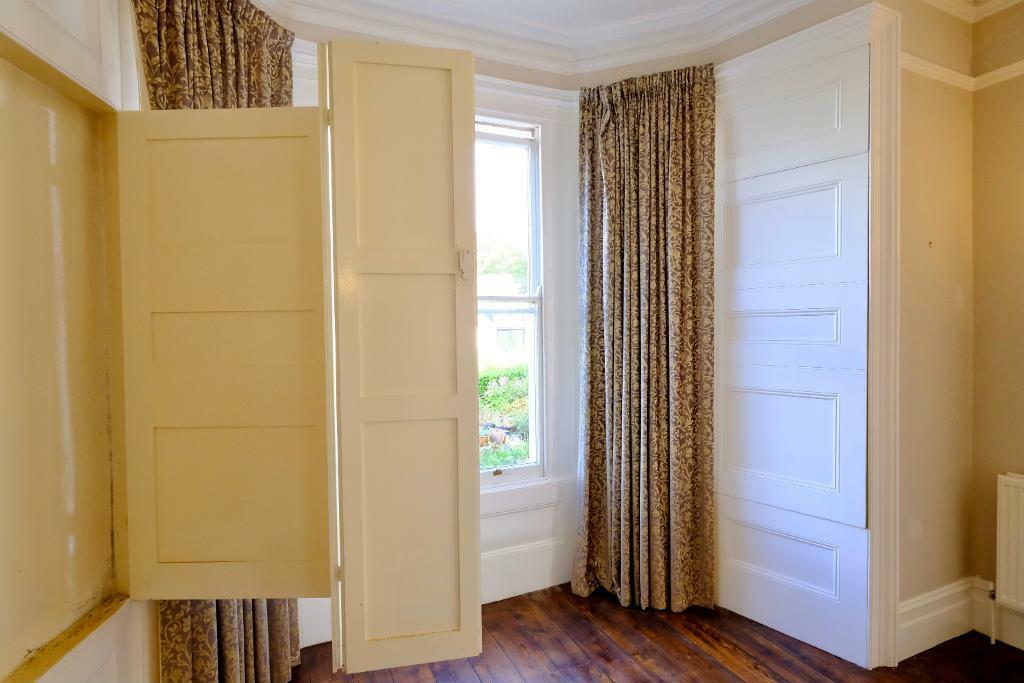 Bay windows with original shutters