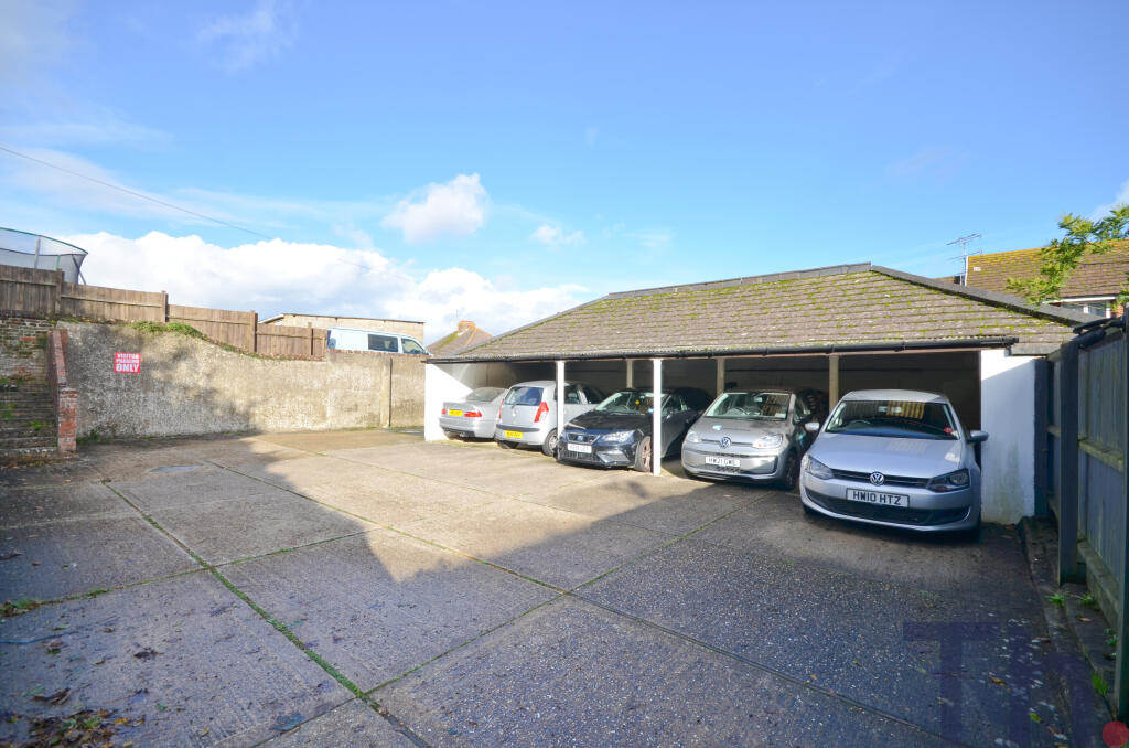 Covered car port &amp; parking area.JPG