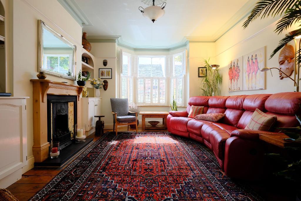 Sitting room with sun filled bay window